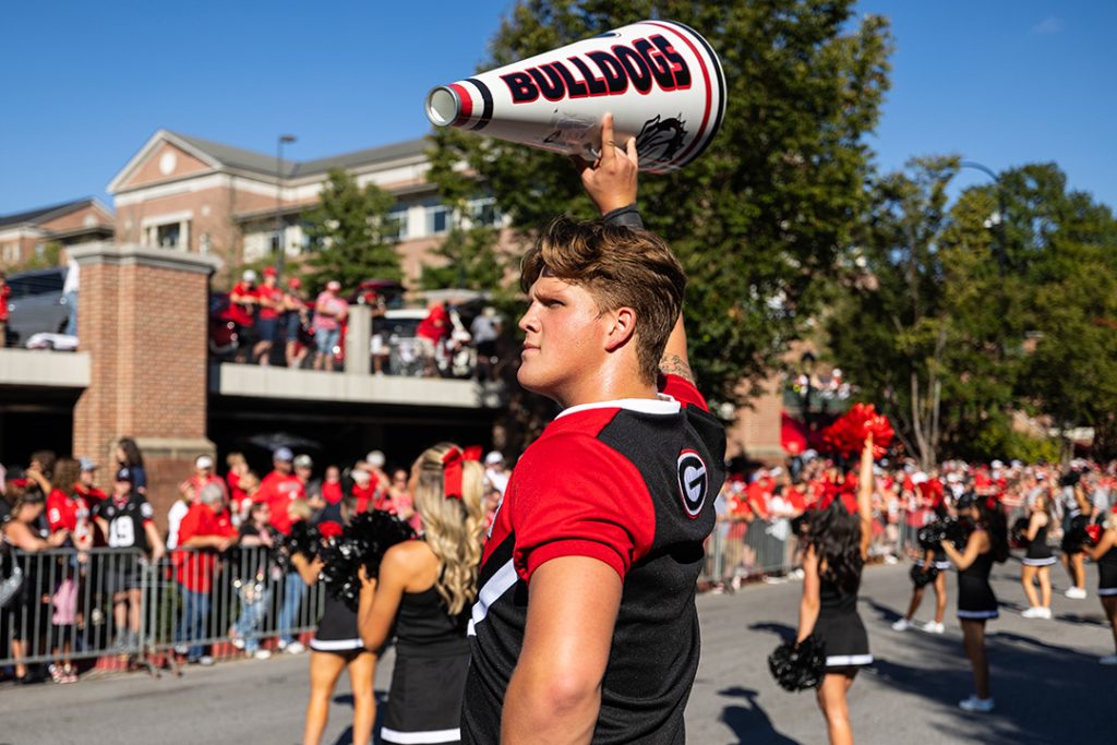 Hamilton cheering on the dawgs