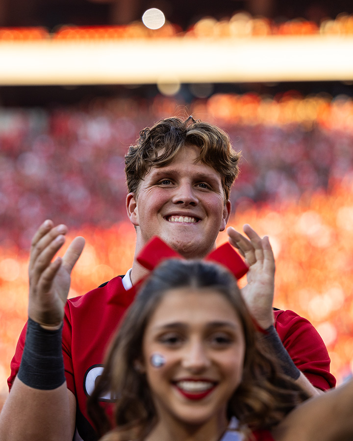 Hamilton cheering at a football game