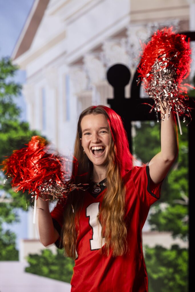 Portrait of Ailey Gustafson, Arch Society member, in the studio for the Game Changers football season campaign.