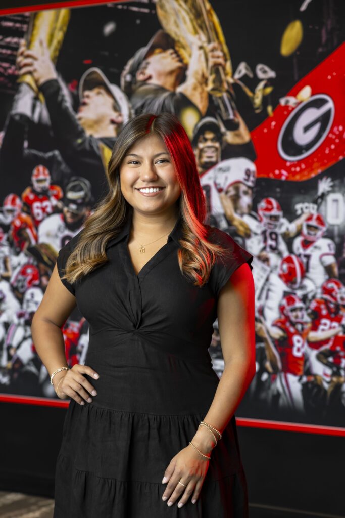 Portrait of Ana Escamilla, Grady student and UGA Athletics Association intern, at Butts-Mehre Heritage Hall.