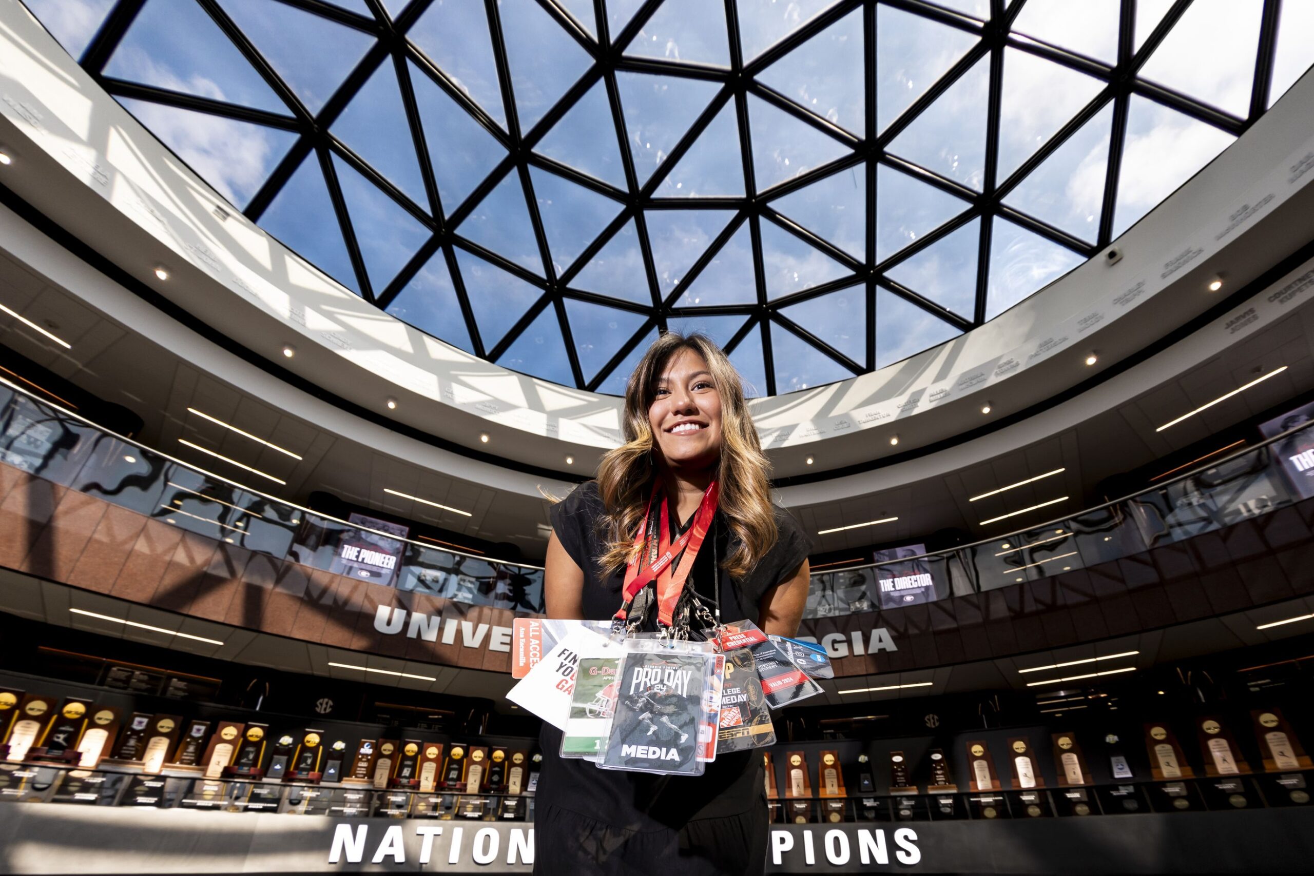 Portrait of Ana Escamilla, Grady student and UGA Athletics Association intern, at Butts-Mehre Heritage Hall.