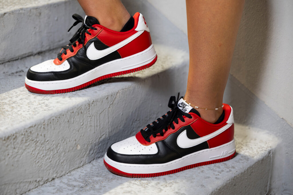 Close-up of Alexandra Milano’s Nike shoes during her portrait session inside Sanford Stadium at night. 